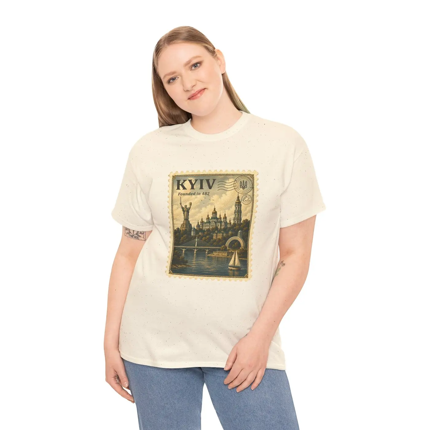A woman wearing the Kyiv T-shirt, the stamp across the chest