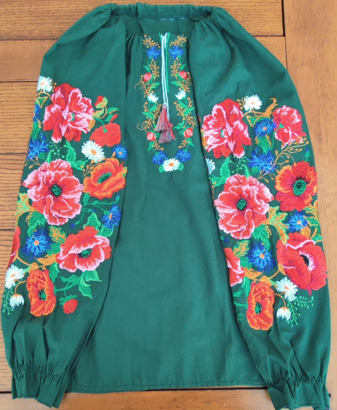 Green floral Ukrainian embroidered blouse presented by Eurostyle UA