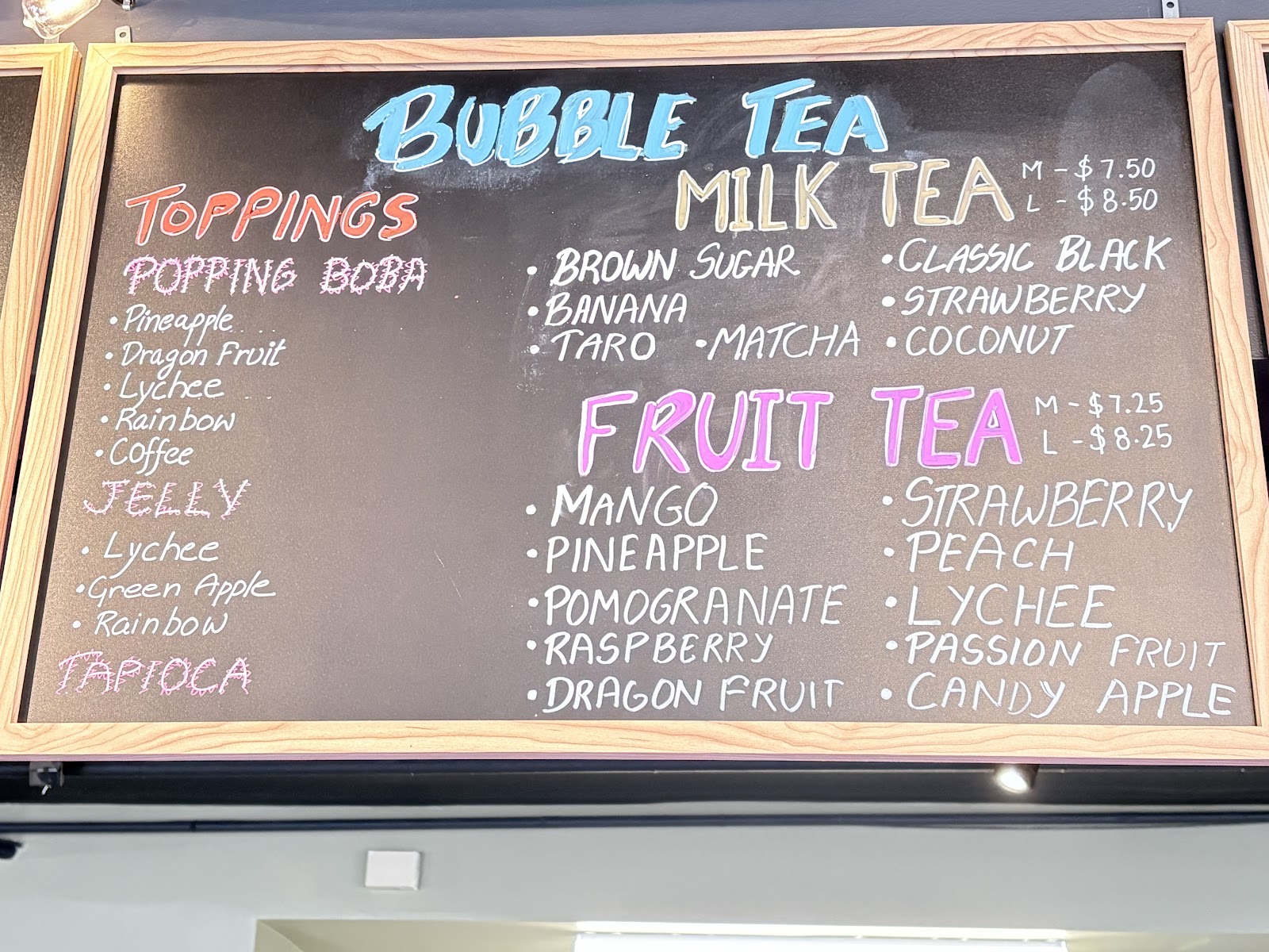 The hand-lettered bubble tea board: milk teas, fruit teas, popping boba, jelly and tapioca toppings