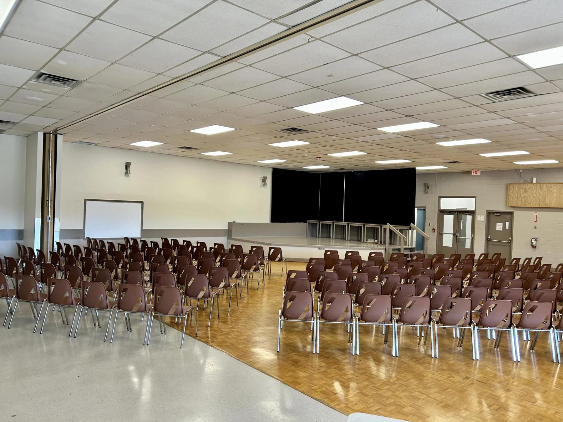 The Arena Upper Hall set up for a concert, rows of chairs facing a stage