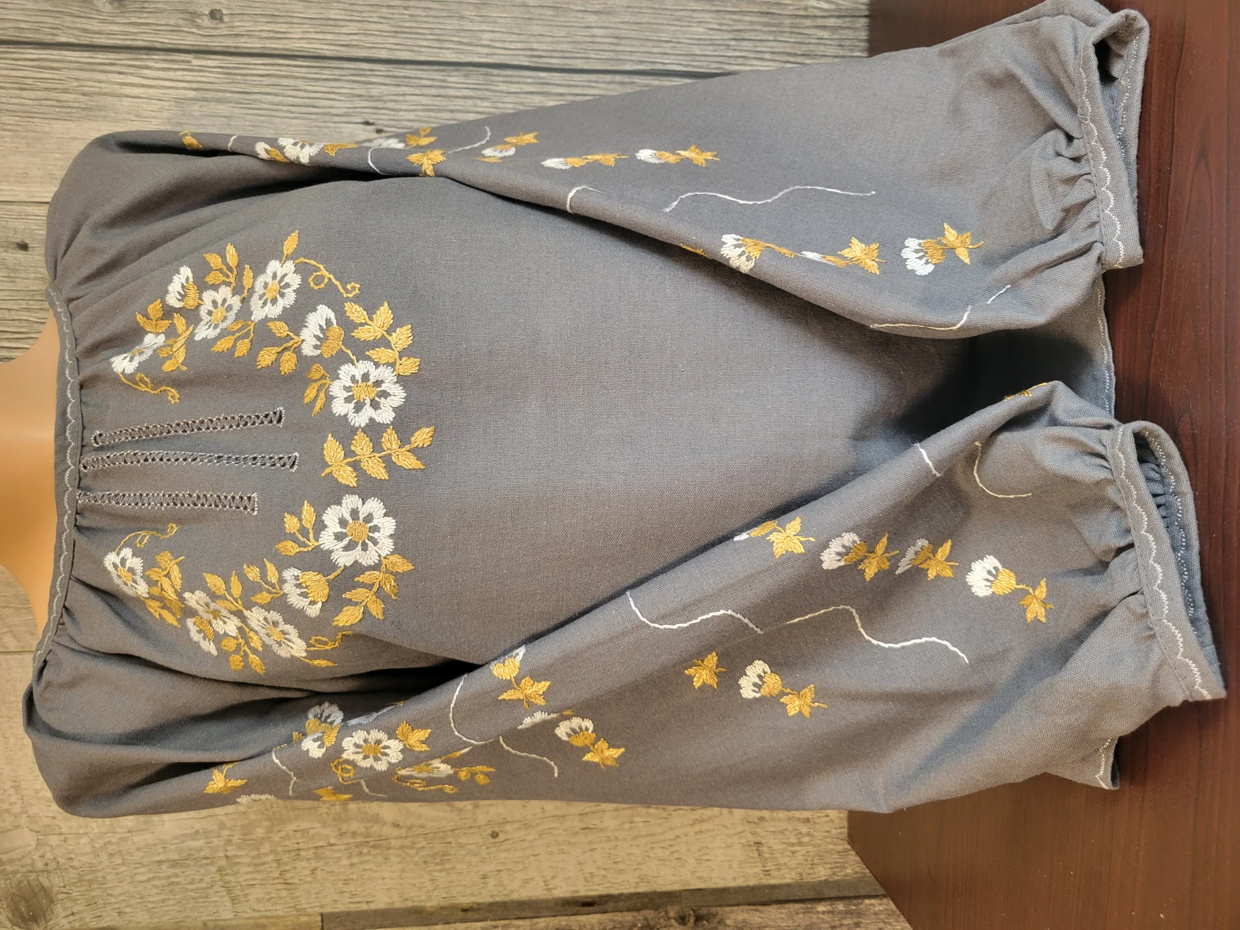 "Сонячна ромашка" — a grey linen women's vyshyvanka hand-embroidered in satin stitch with daisies and yellow leaves