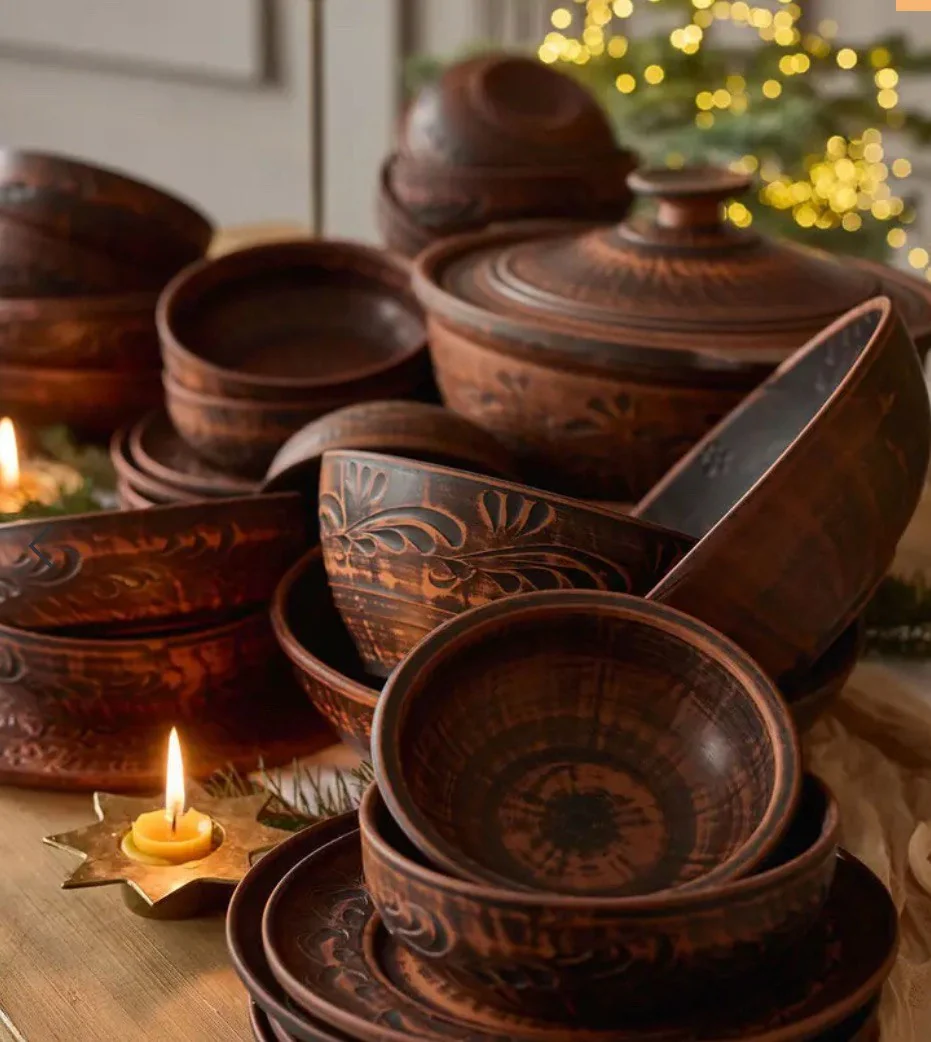 Ukrainian clay dishes — bowls, pots and a lidded jar